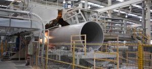 A large composite pipe section being manufactured